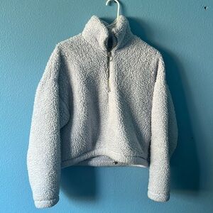 Small light blue half zip fuzzy jacket
